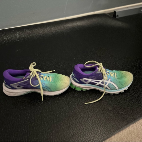 ASICS GT1000 road running shoe in blue, yellow, and green. - Picture 3 of 5